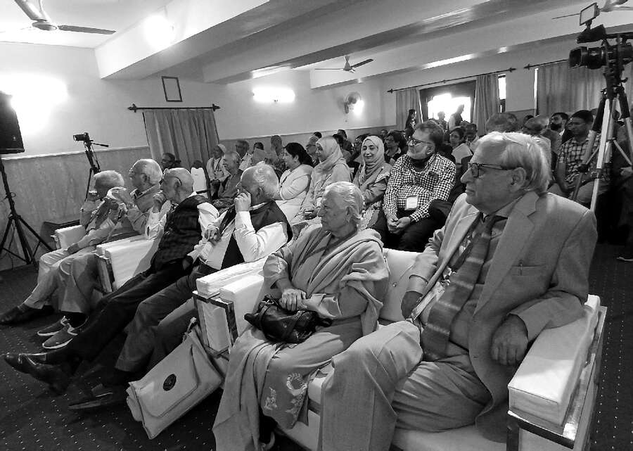 The festival audience seated in the hall at Hotel Nehrus