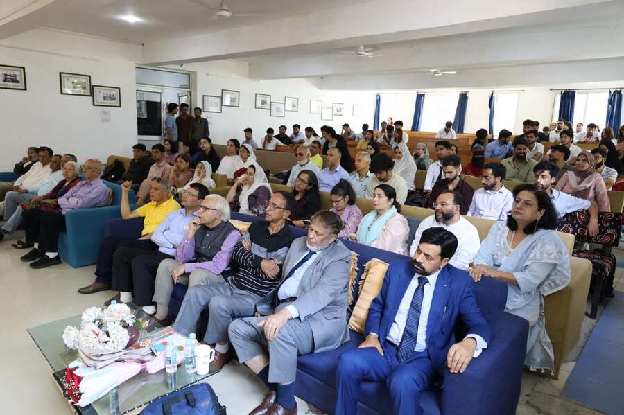A full seminar hall of students and scholars at SSM College of Engineering
